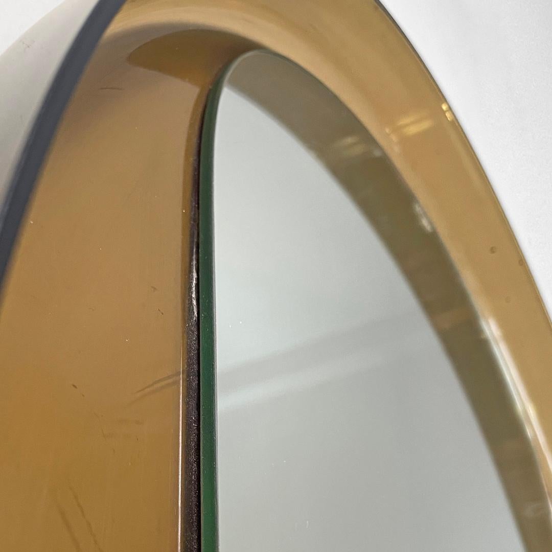 Italian modern round wall mirror in semitransparent brown plastic, 1970s  3