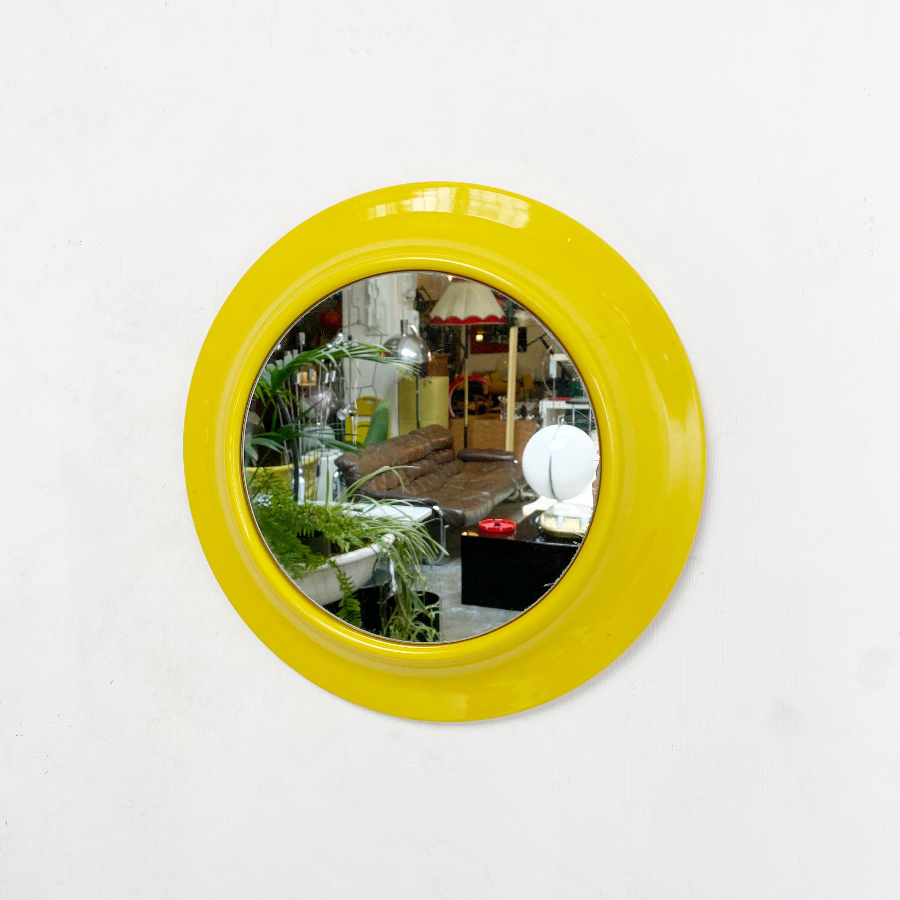 Round yellow plastic mirror, 1980s
Small size mirror with round yellow plastic frame. Model 080, branded Cattaneo, made in Italy.

Good condition, evident signs on the mirror.

Measures in cm 30 x 6.