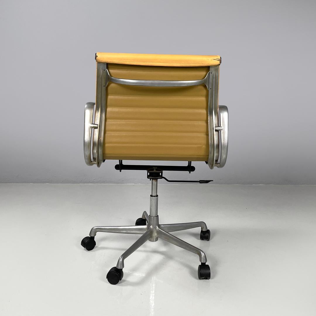 Metal Italian modern salmon pink leather swivel office chair by Eames for ICF, 1970s For Sale
