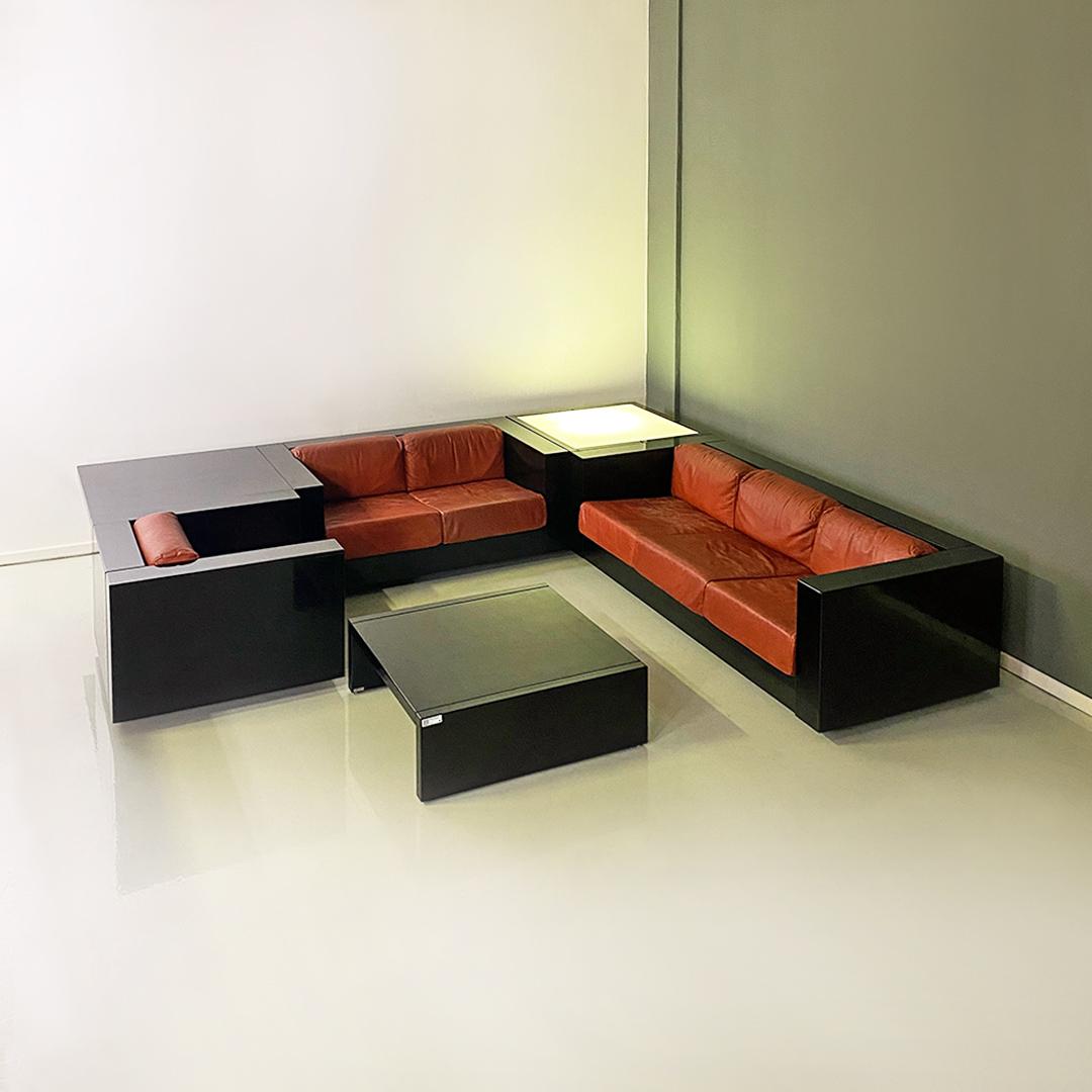 Italian post modern black lacquered wood and brown leather Saratoga living room set by Massimo and Lella Vignelli for Poltronova, 1980s
Living room in black lacquered wood and brown leather cushions, Saratoga model, composed of a three-seater sofa,