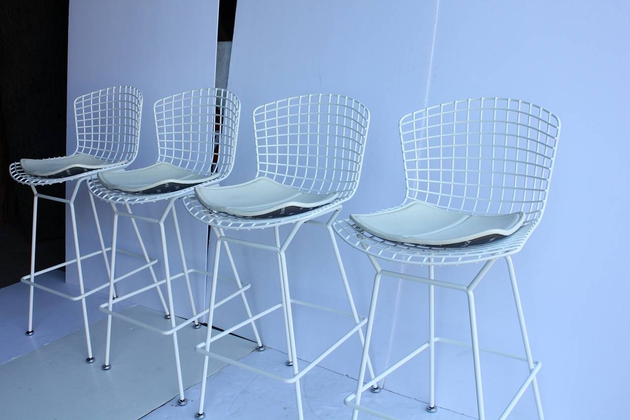 Italian modern sculptural bar stool by Harry Bertoia for Knoll. Each bar stool has leather soft pad. Only 2 stools available. Listed price is for each stool.