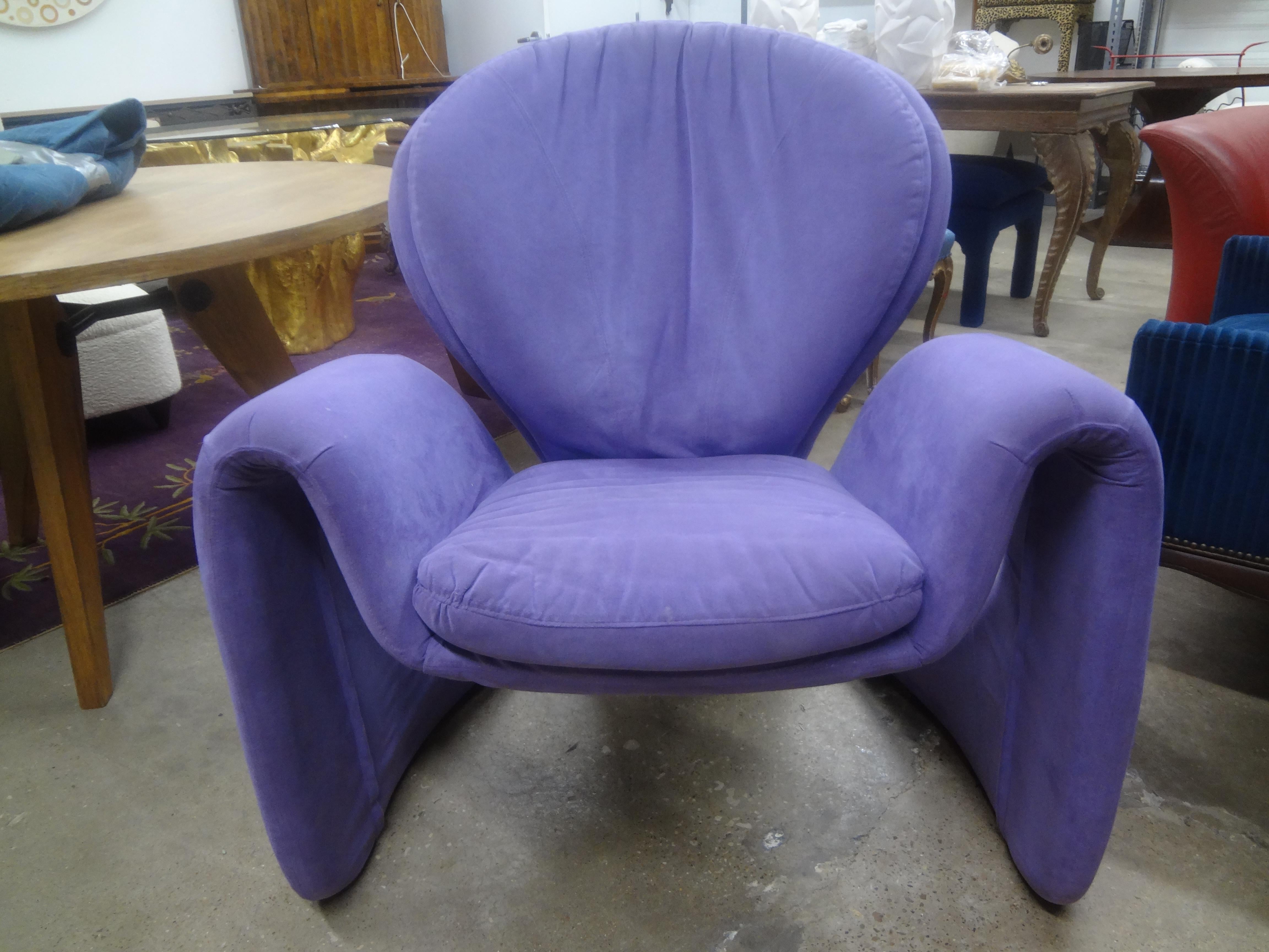 Italian Modern Sculptural Lounge Chair Attributed To Vittorio Introini For Saporiti.
This Postmodern chair, stunning from every angle is most comfortable and has been attributed to Olivier Mourgue. It retains the original lavender ultrasuede fabric