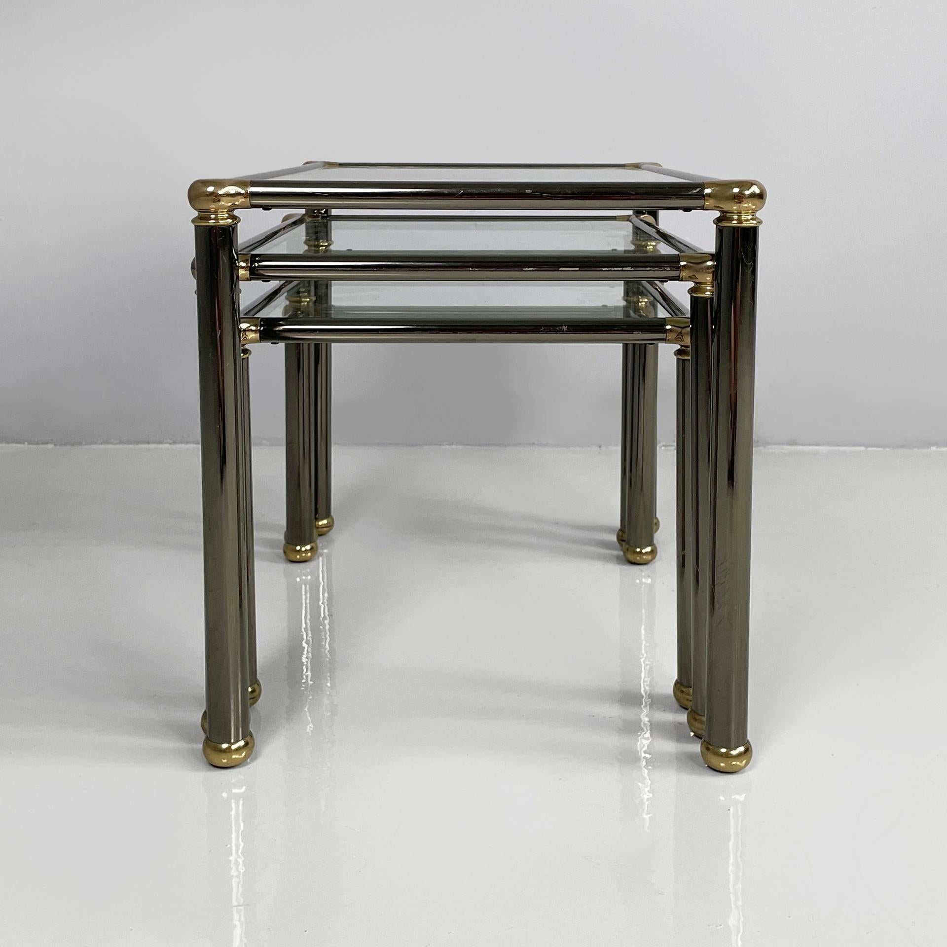 Late 20th Century Italian modern set of coffe tables in metal and glass, 1980s For Sale