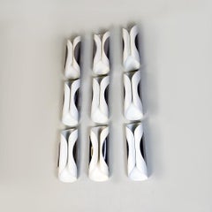 Italian Modern Set of Nine Curved Metal Sheet Wall Lamps, 1970s