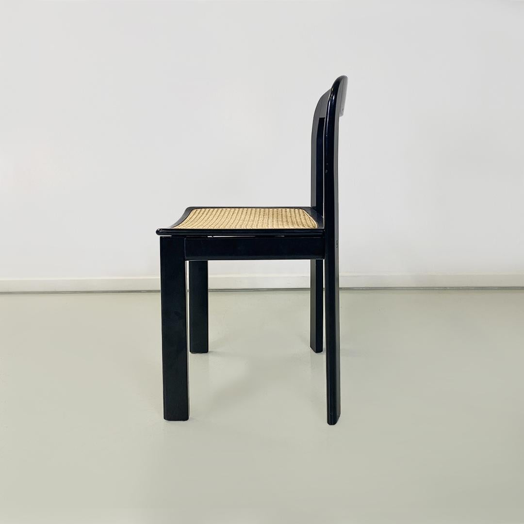 Paille Ensemble de six chaises modernes italiennes en bois laqué noir et paille de Vienne, années 1980