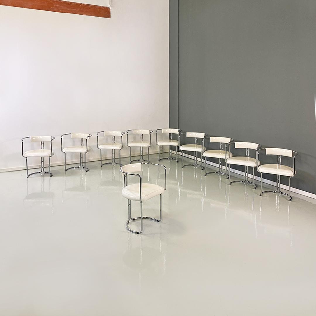 Italian modern set of ten steel and white glossy faux leather chairs, 1970s
Set of ten tub chairs with chromed tubular steel structure and glossy white sky upholstered seat and back.
1970s approx.
Good general conditions, some signs on the
