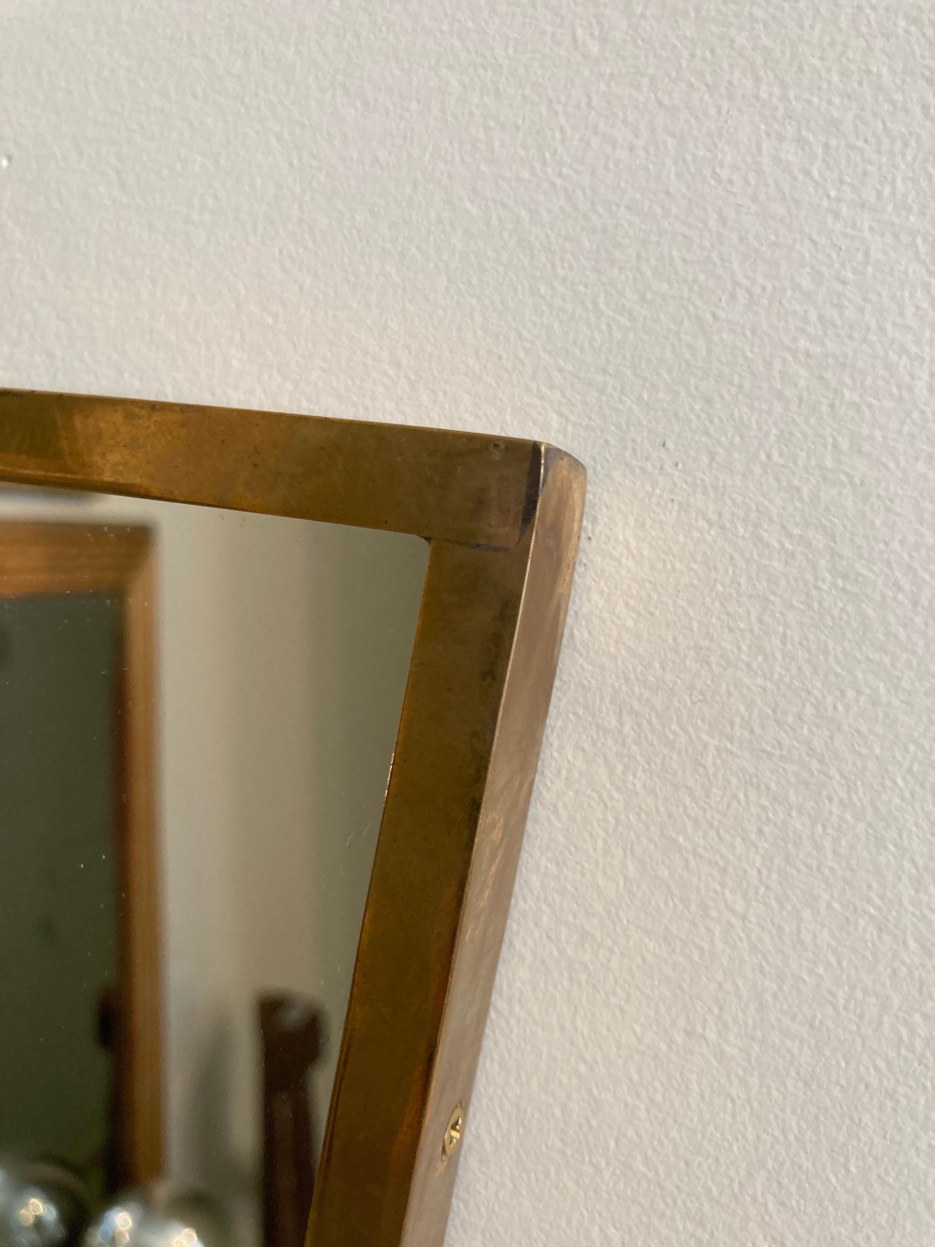 Late 20th Century Italian Modern Shaped Brass Framed Mirror