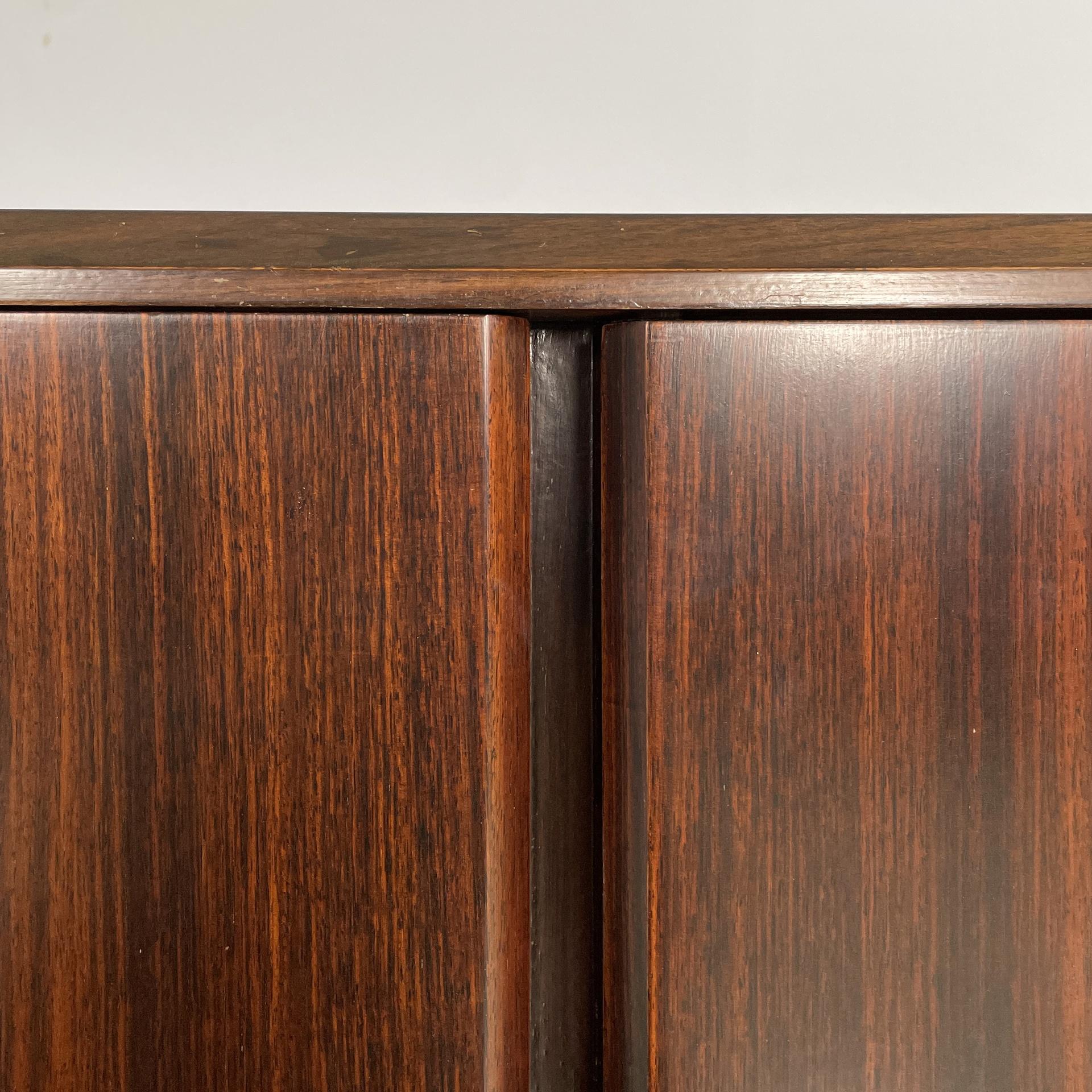 Italian modern sideboard in wood with hinged doors, shelves and drawers, 1970s For Sale 5