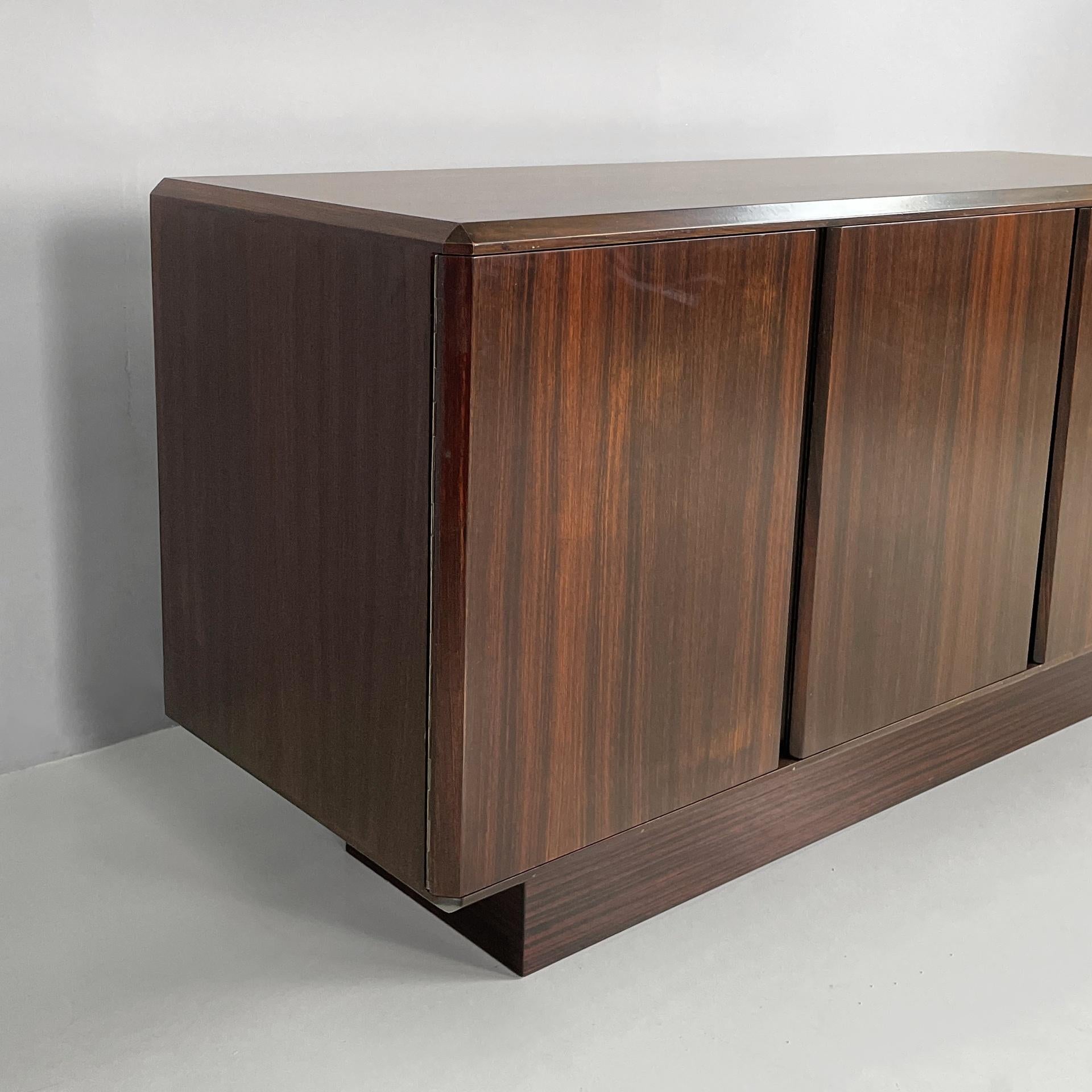 Italian modern sideboard in wood with hinged doors, shelves and drawers, 1970s For Sale 10
