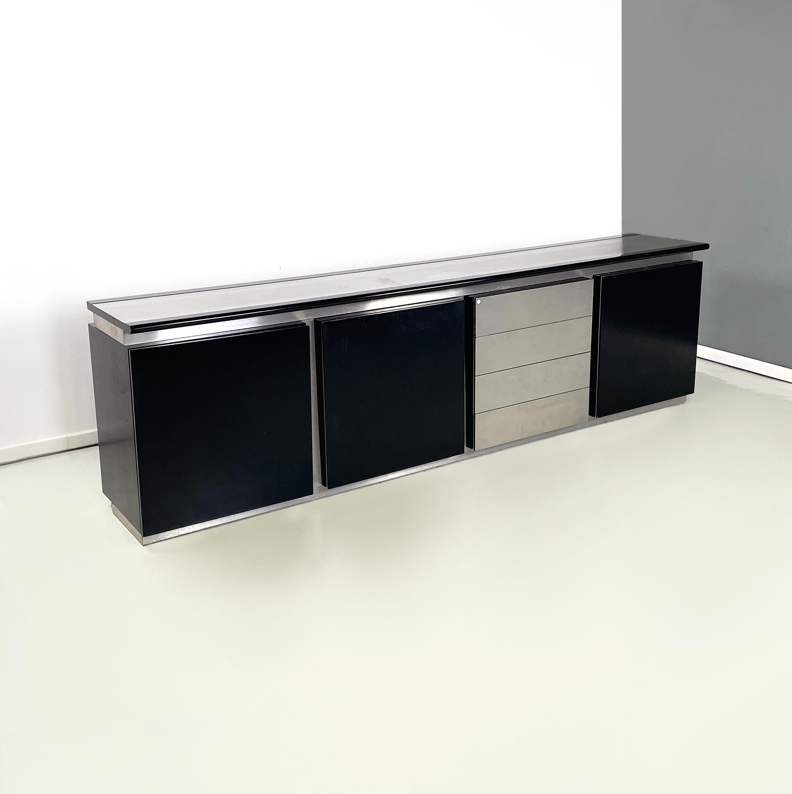 Italian modern Sideboard Parioli  by Giotto Stoppino and Marco Acerbis for Acerbis, 1980s
Sideboard mod. Parioli composed of 4 modules with solid wood structure with matt black finish and aluminum profiles. On the front it has three hinged doors and
