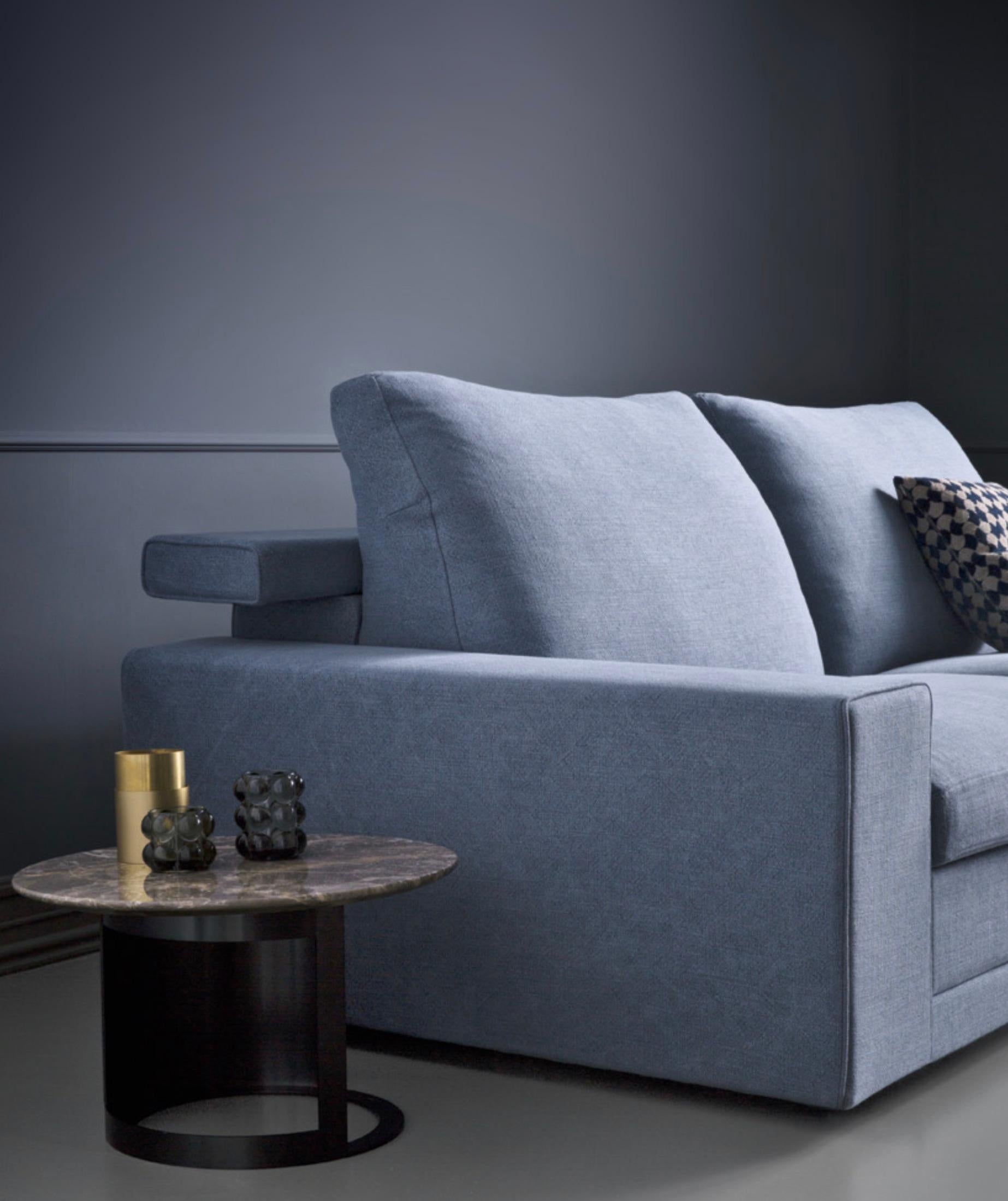 Elegant Italian modern sofa bed with low and large armrests and flip back shelf to support the back cushions. From Design Italian Furniture Modern collection, this featured sofa bed is shown as a one piece but it is also available in sectional