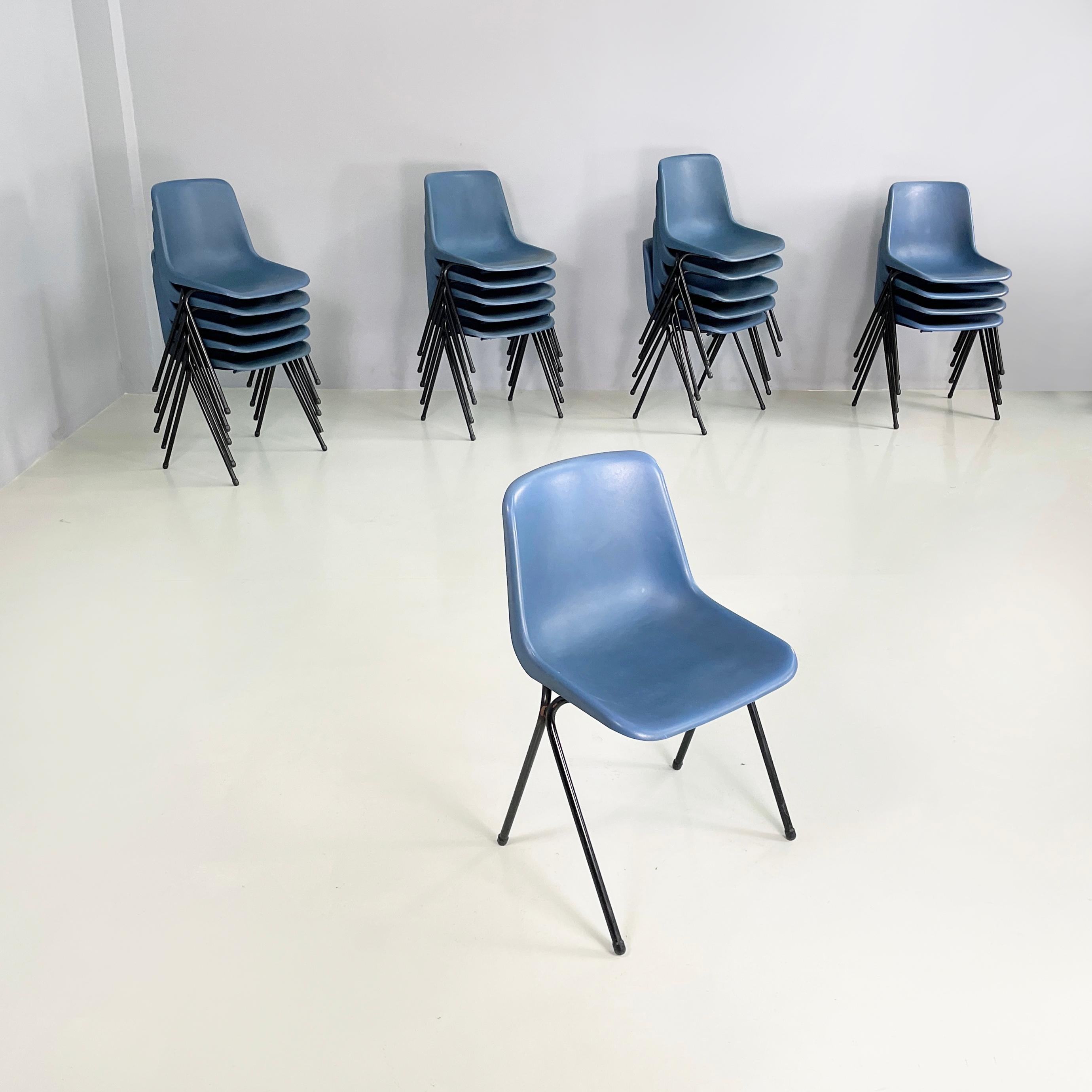 Italian modern Stackable chairs in blue plastic and black metal, 2000s
Set of 20 chairs with curved monocoque in blue plastic. The legs are made of black painted metal rod. Stackable.
2000s. Under the seat there are a logo and a label.
Vintage