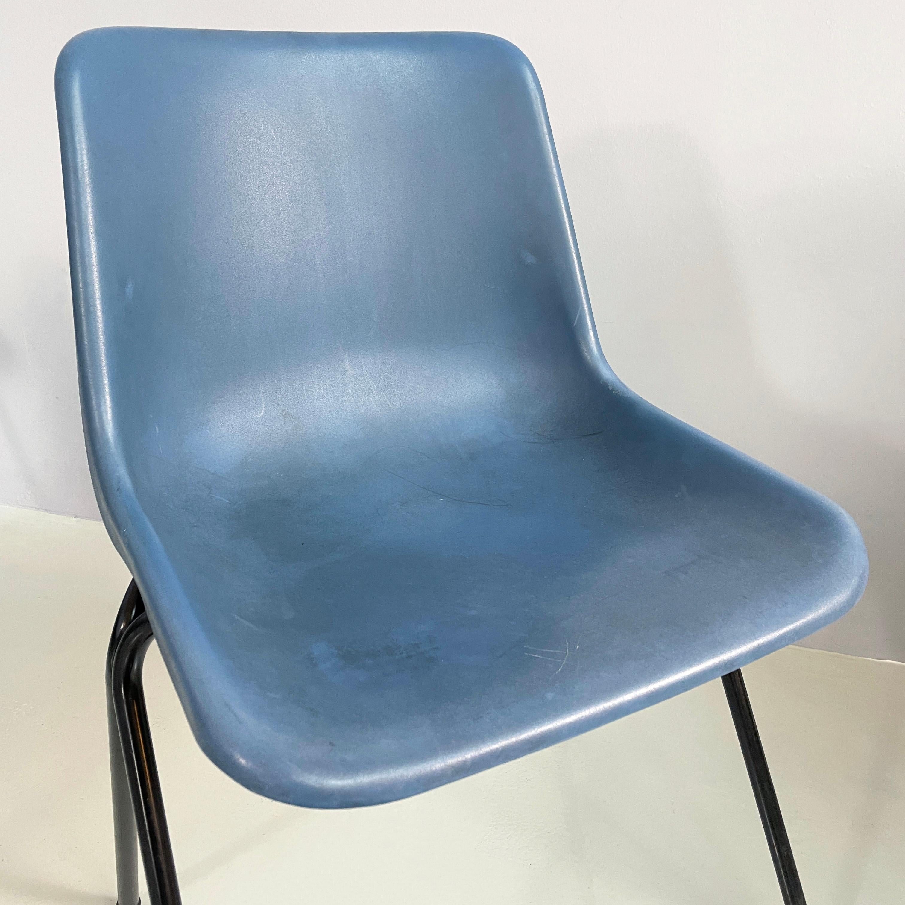Plastic Italian modern Stackable chairs in blue plastic and black metal, 2000s For Sale