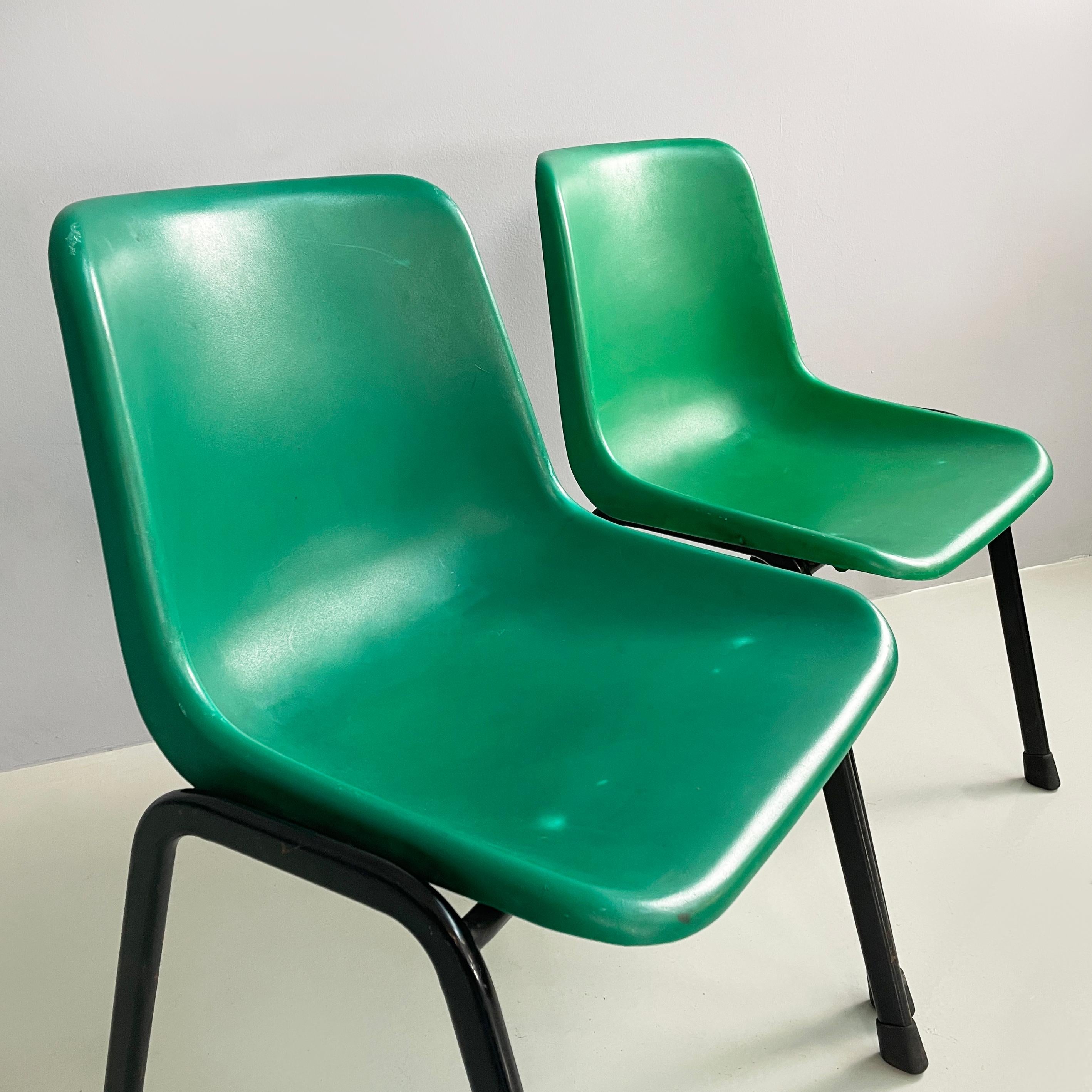 Italian modern Stackable chairs in green plastic and black metal, 2000s For Sale 1