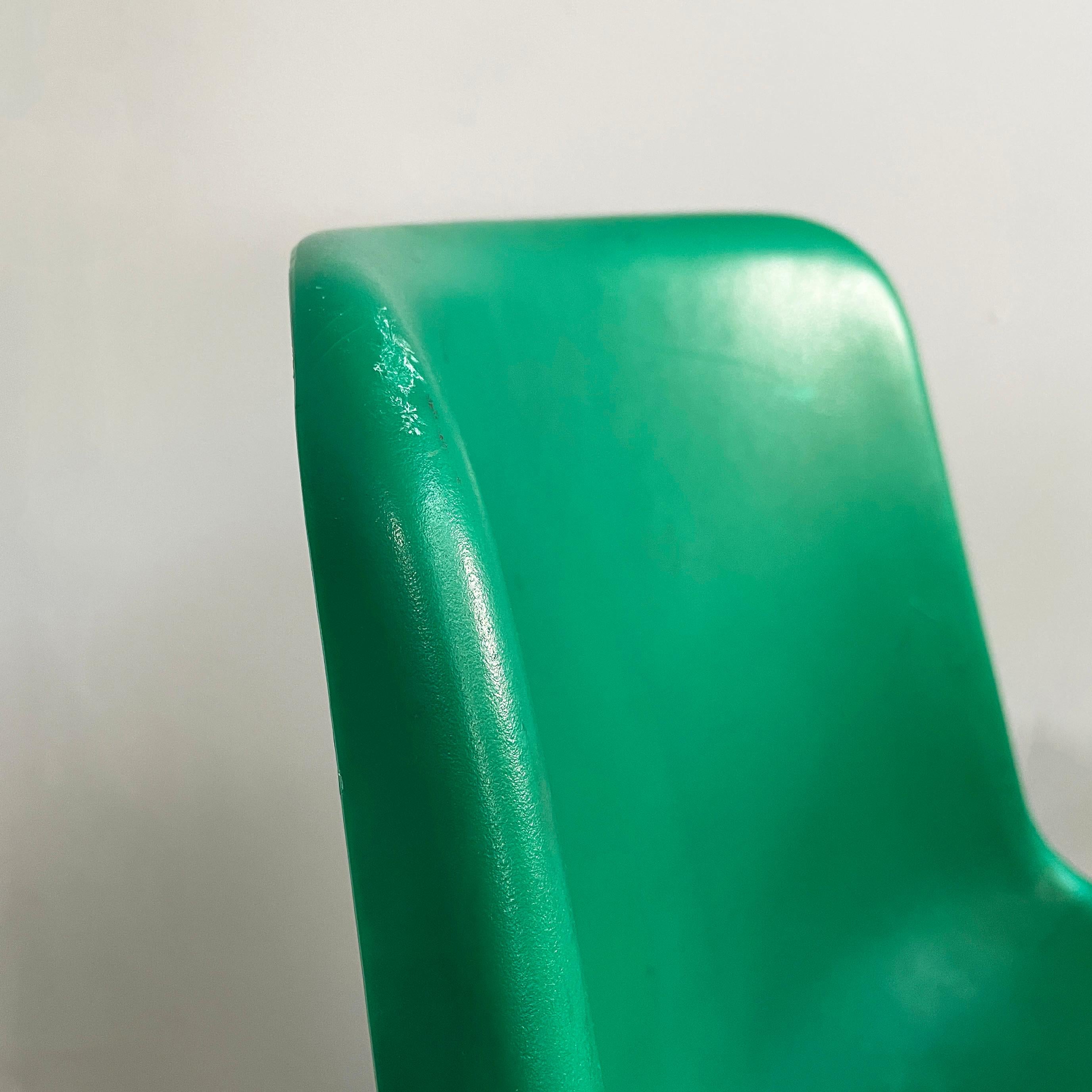 Italian modern Stackable chairs in green plastic and black metal, 2000s For Sale 3