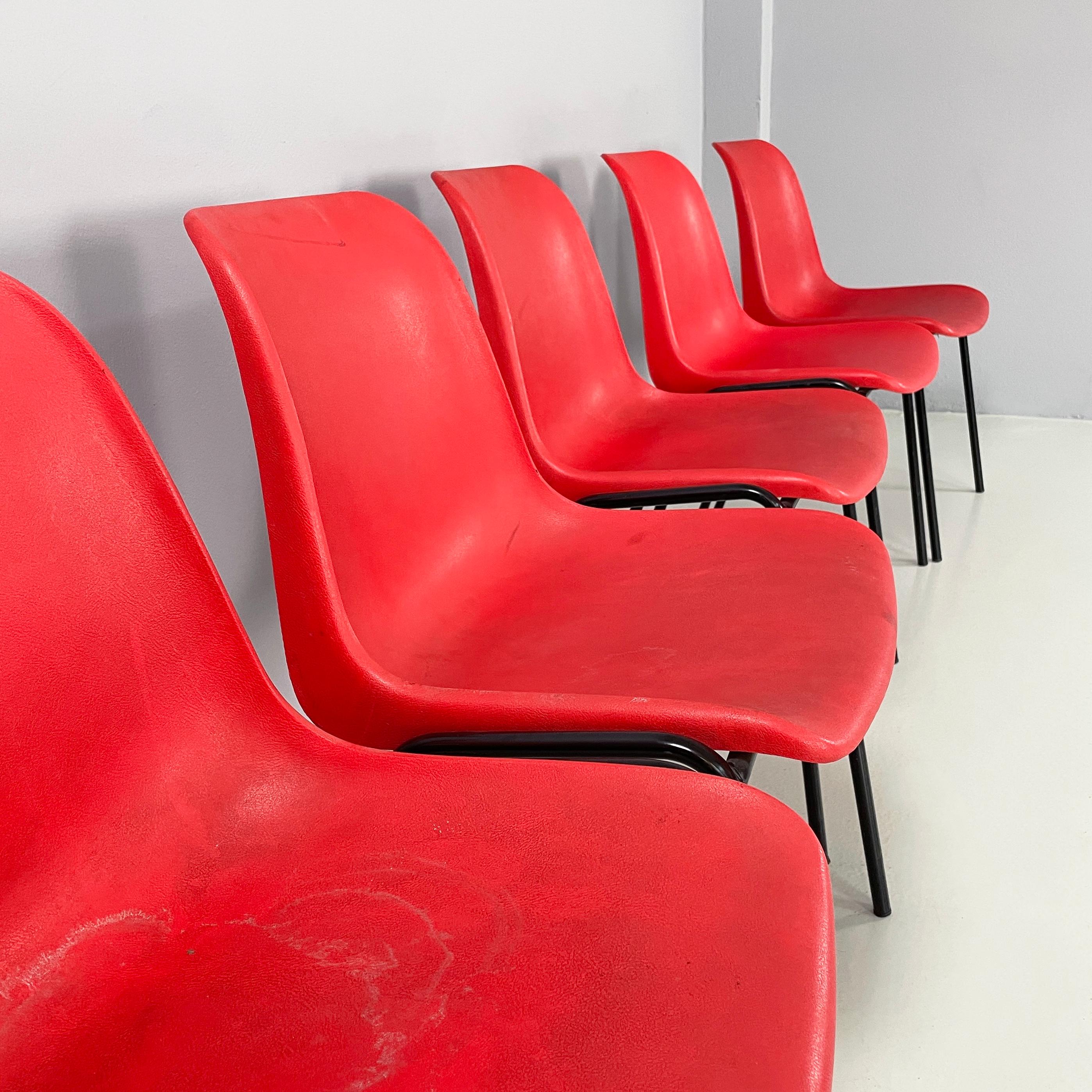 Contemporary Italian modern Stackable chairs in red plastic and black metal, 2000 For Sale