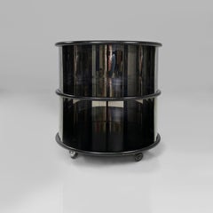 Italian modern steel and black wood bedside table, 1970s
