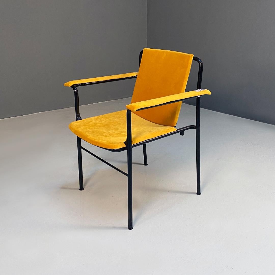 Italian modern matt steel and yellow velvet stackable Movie chair with armrest by Mario Marenco for Poltrona Frau, 1970s.
Stackable chair, with armrests, Movie model, with structure in tubular steel, matt and black. The seat, back and armrests are