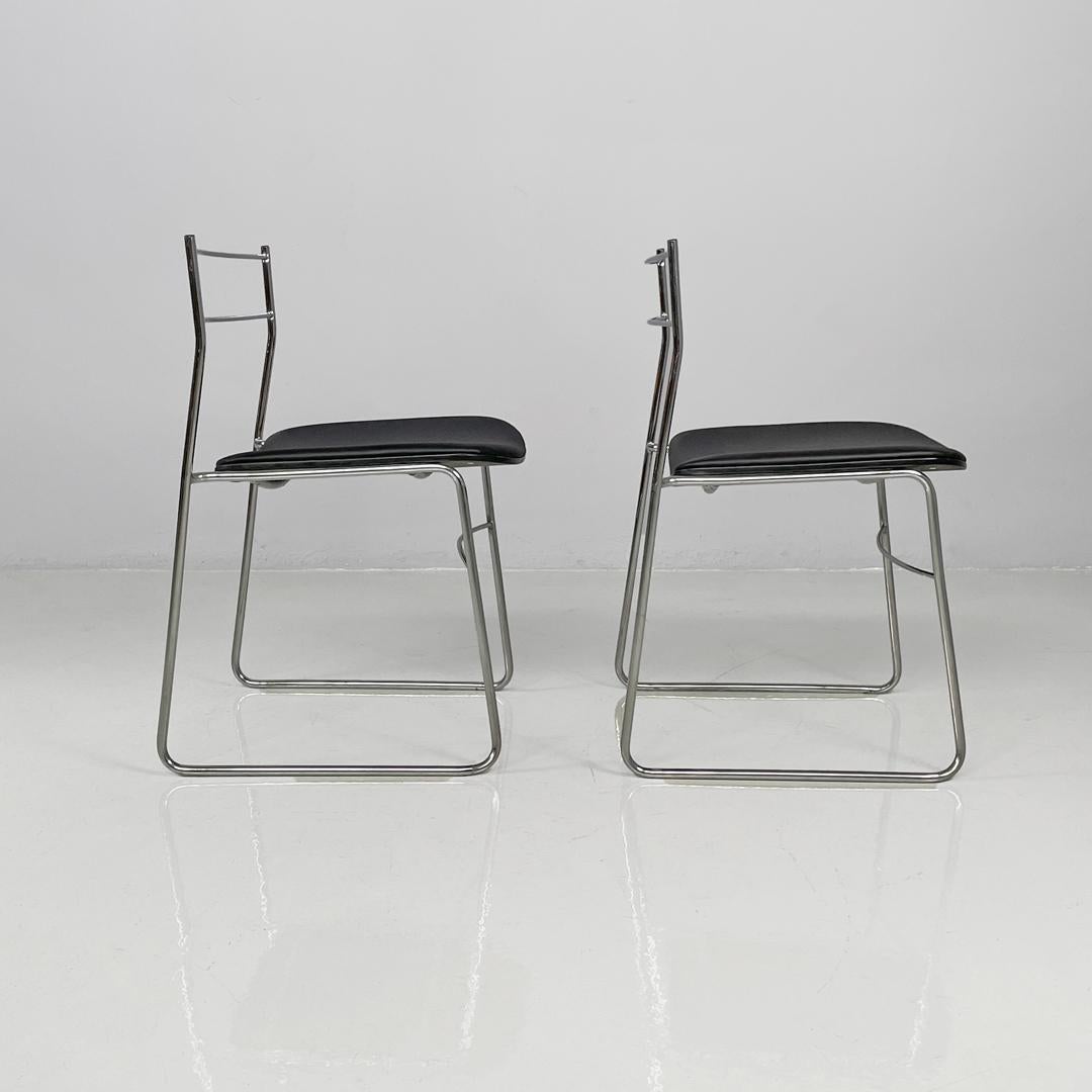 Italian modern steel rod and black leatherette chairs, 1970s
Pair of metal and black leather chairs. The frame is made of chromed steel rod. The seat is covered in leatherette in black matt color.
1970s
Good condition, with small marks and oxidation