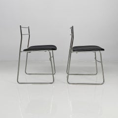Italian modern steel rod and black leatherette chairs, 1970s