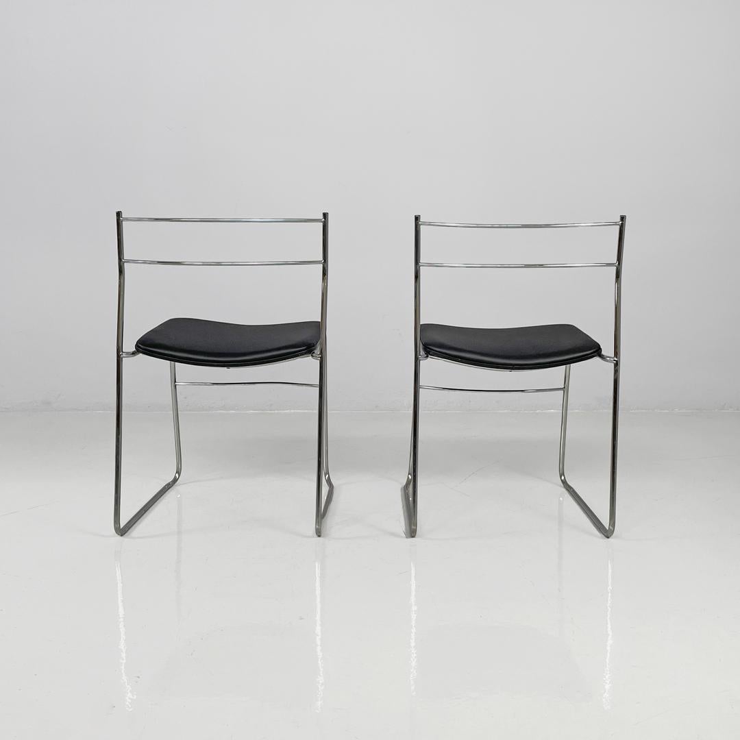 Modern Italian modern steel rod and black leatherette chairs, 1970s For Sale