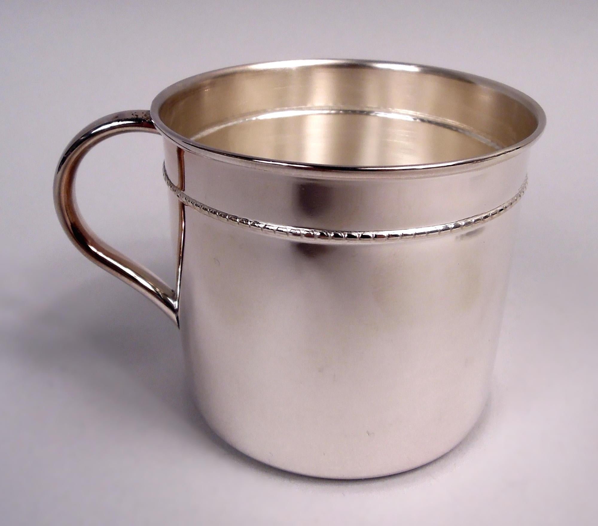 Italian Modern sterling silver baby cup. Drum form with beaded band and c-scroll handle. Plenty of room for engraving. Fully marked including post-1967 maker’s stamp (Rino Greggio). Weight: 1.5 troy ounces.