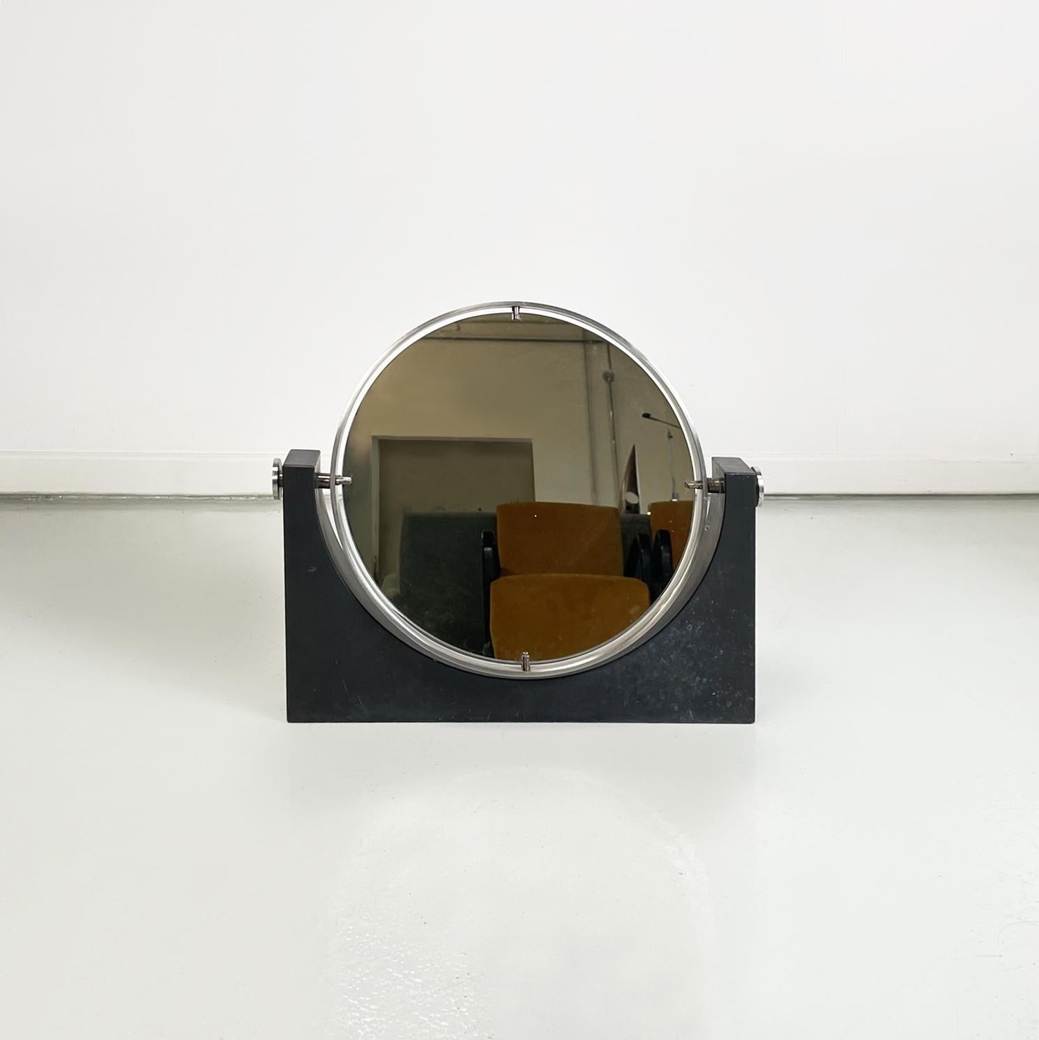 Italian modern table mirror in slate an metal by Angelo Mangiarotti, 1980s
Double round table mirror with metal frame. The frame is connected to the slate structure thanks to thin metal rods, which also allow the mirror to rotate.
Designed and