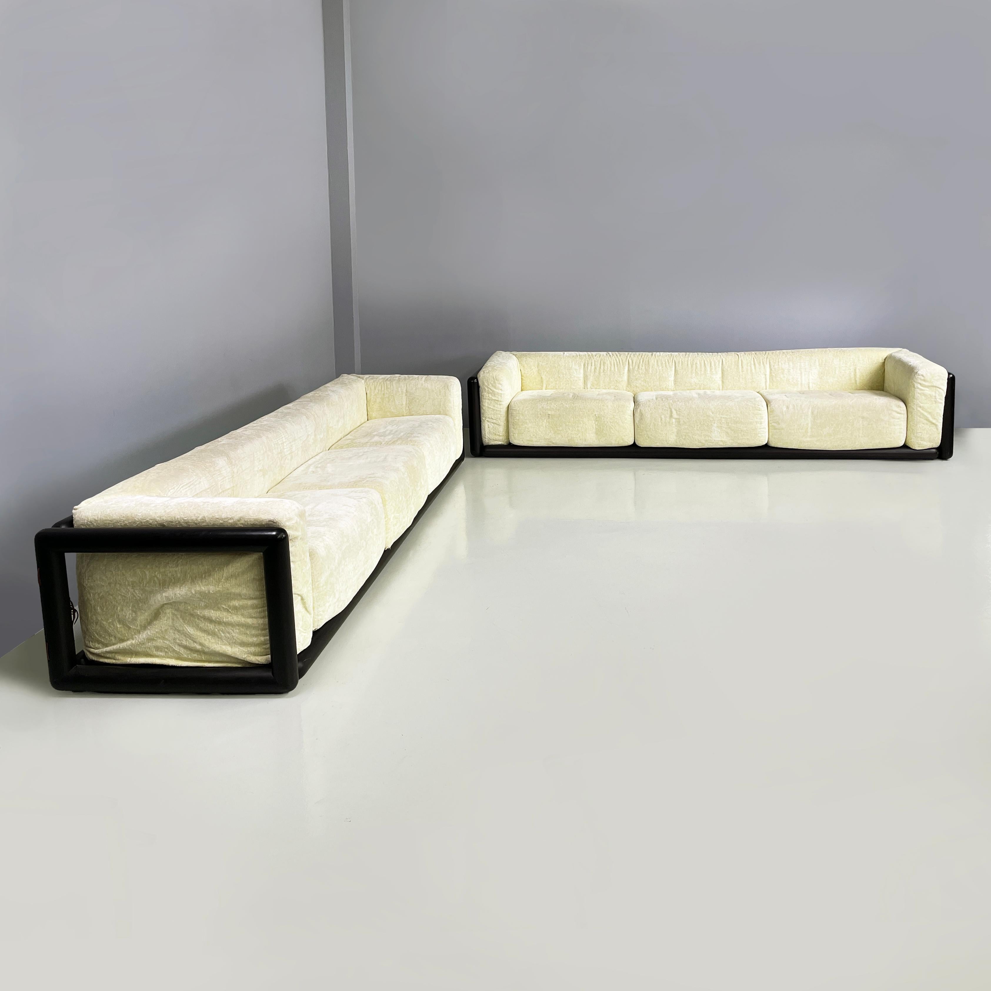 Italian modern Three-seater sofas Cornaro by Carlo Scarpa for Simon Gavina, 1980s
Pair of three-seater sofa mod. Cornaro with round section structure in black painted solid wood. The seat is made up of three padded cushions covered in yellow-beige