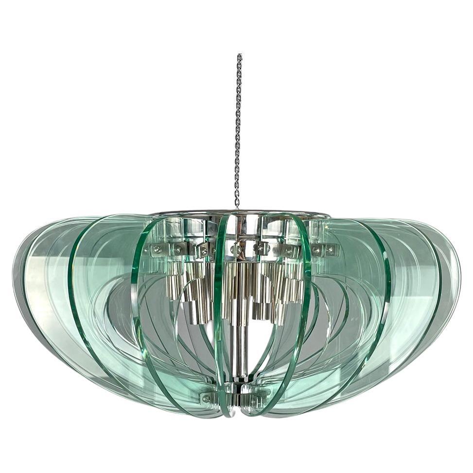 Italian modern transparent rounded glass and chromed metal chandelier, 1970s
