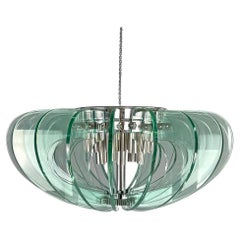 Italian modern transparent rounded glass and chromed metal chandelier, 1970s