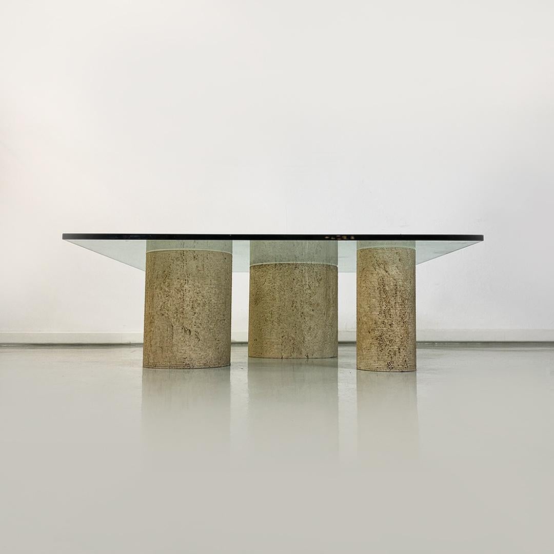 Italian modern travertine and aquamarine green glass coffee table Di Uno Tre by Giulio Lazzotti for Casigliani, 1980s
Glass and travertine coffee table mod. Di Uno Tre, composed of three cylindrical travertine sculptures, two of which are empty and
