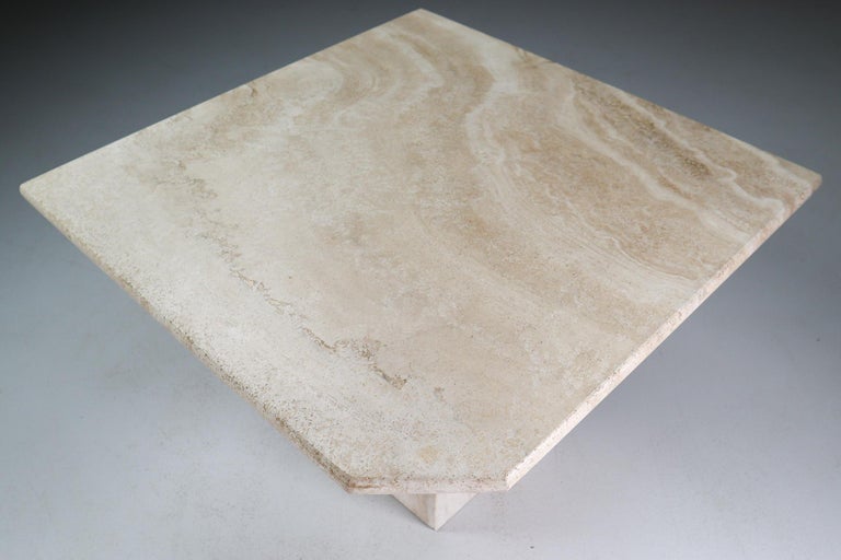 This beautiful modern travertine side - coffee table, circa 1970s, has beautiful graining and pentagonal top. This sculptural travertine side table would work great in a Traditional, Transitional, Hollywood Regency, classical or Art Deco room with a