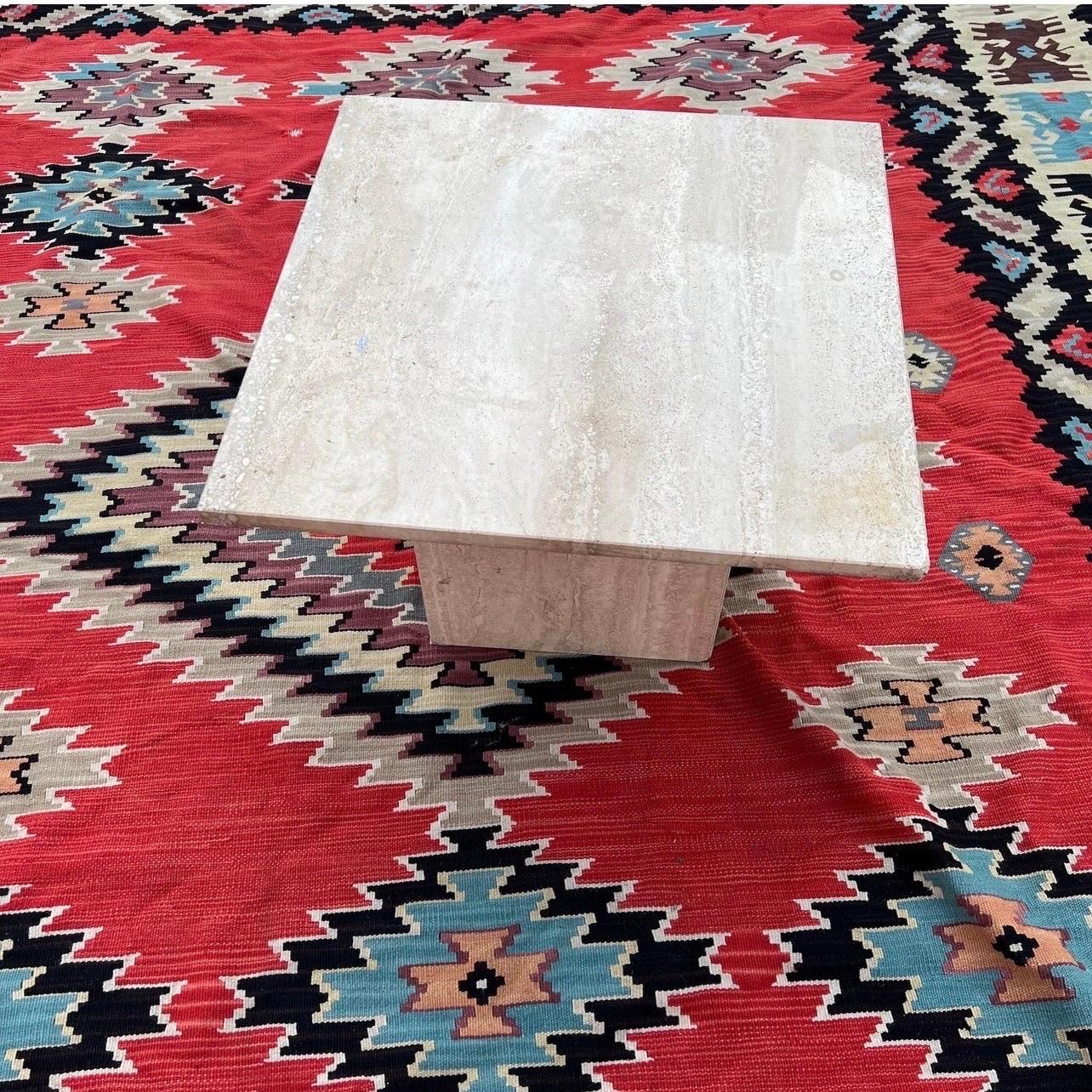1980’s Italian modern travertine square side table. This piece could easily work as a coffee table in a small apartment. This is a timeless piece.   Top comes off. Square pedestal base.  
