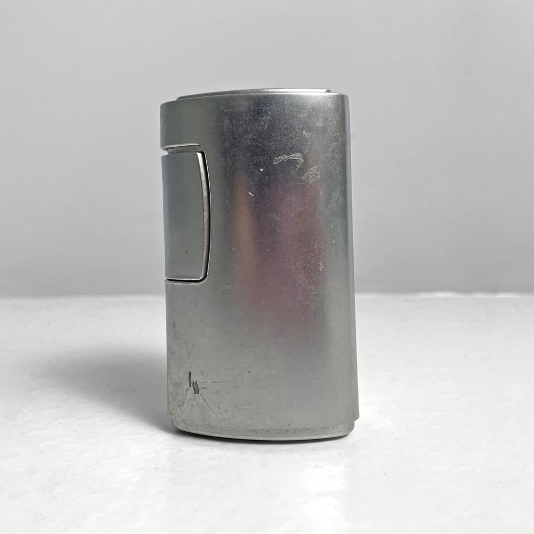 Italian modern triangular silver plastic table lighter RO 456 by Rowenta, 1970s In Fair Condition For Sale In MIlano, IT