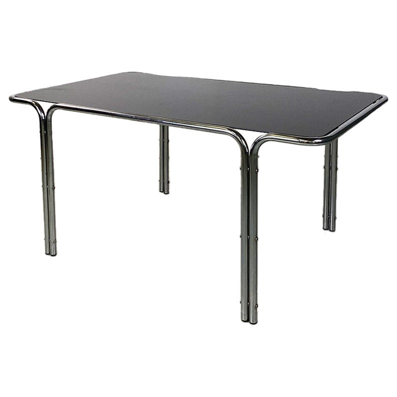 Mesa de comedor o escritorio italiano moderno de tubo de acero y cristal ahumado, años 70