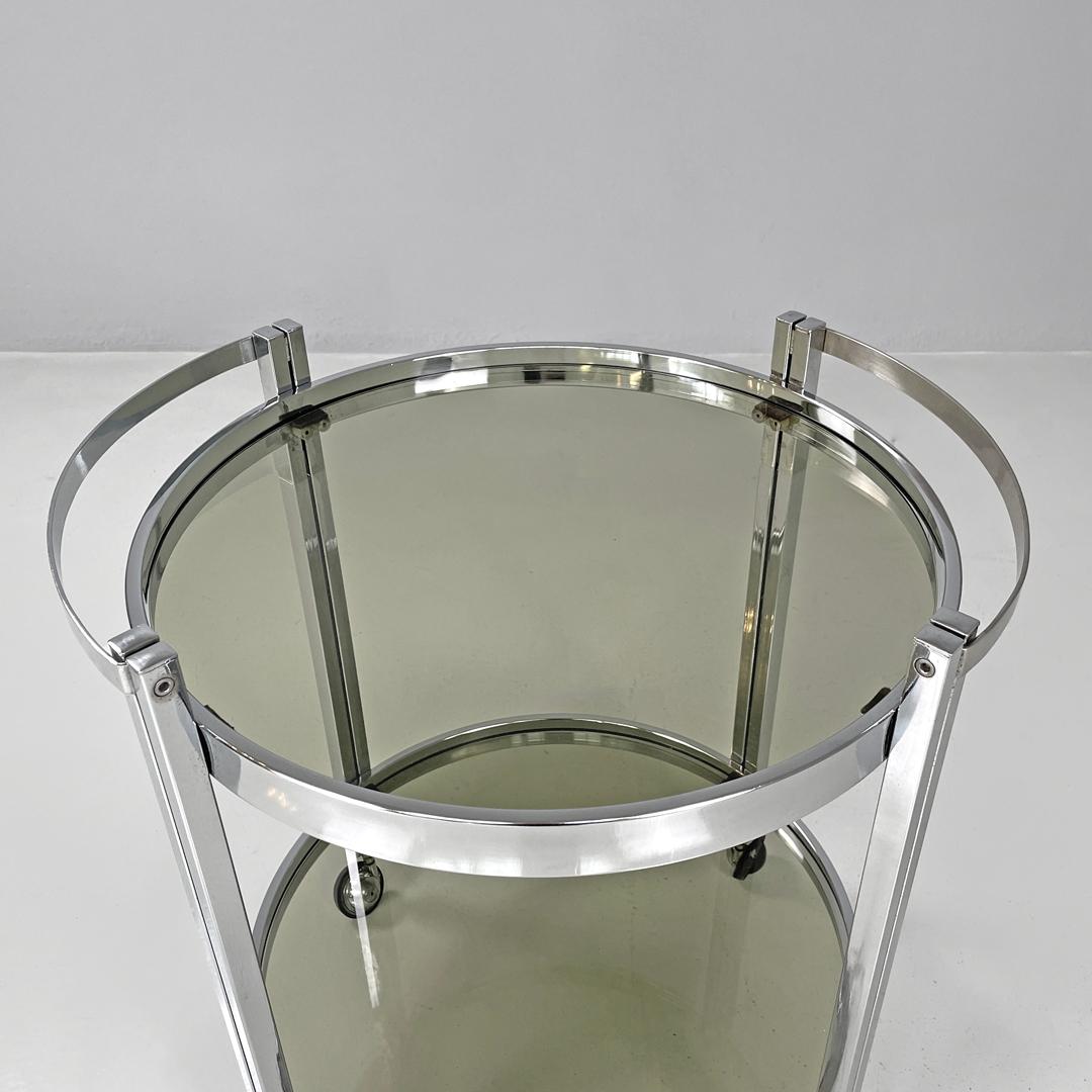 Italian modern two tops chromed metal and smoked glass cart with wheels, 1970s For Sale 4