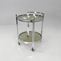 Italian modern two tops chromed metal and smoked glass cart with wheels, 1970s