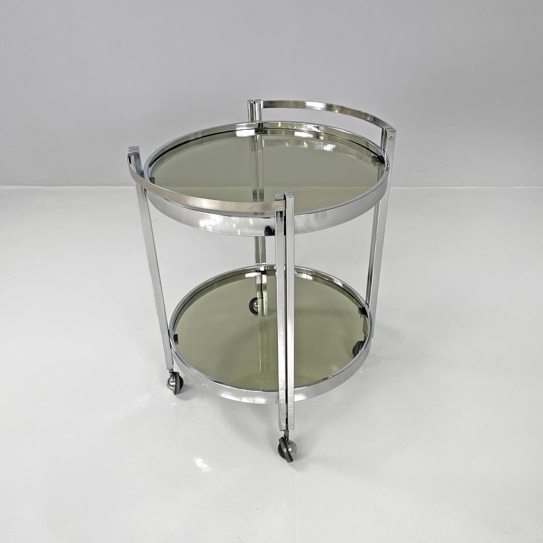 Modern Italian modern two tops chromed metal and smoked glass cart with wheels, 1970s For Sale