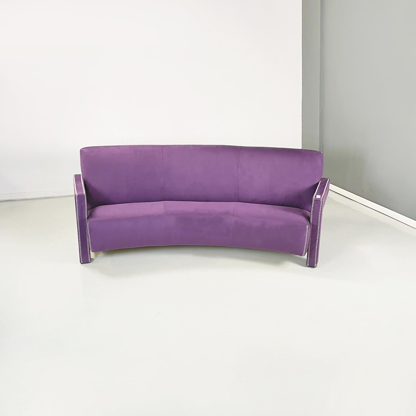 Italian modern Velvet sofa mod. Utrecht by Gerrit Thomas Rietveld for Cassina , 1990s
fantastic three-seater sofa mod. Utrecht with curved seat and backrest, padded and upholstered in purple velvet with visible white stitching. The squared armrests