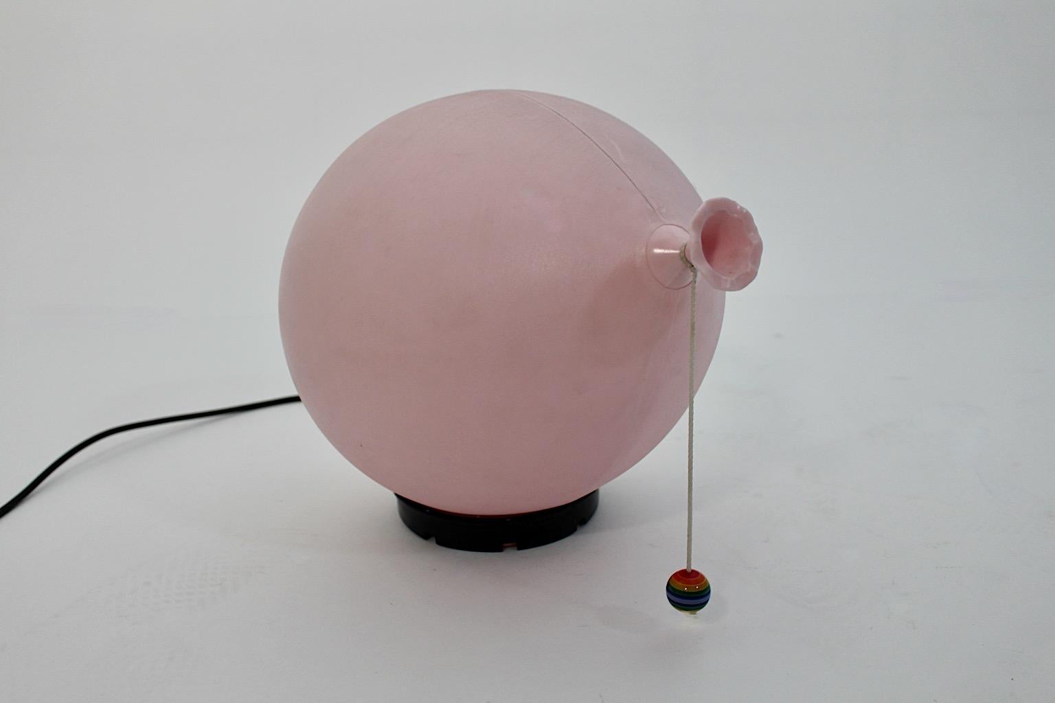 Italian modern vintage pink plastic balloon table lamp or sconce or wall lighting by Yves Christin for Bilumen, 1980s, Italy.
A stunning table lamp balloon like from plastic in pastel pink color with cable and plug and an on / off switch.
This