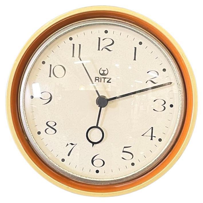 Italian modern Wall clock in gold and orange wood and metal by Ritz, 1960s