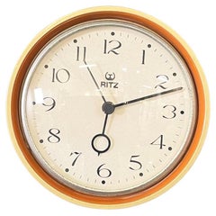 Vintage Italian modern Wall clock in gold and orange wood and metal by Ritz, 1960s