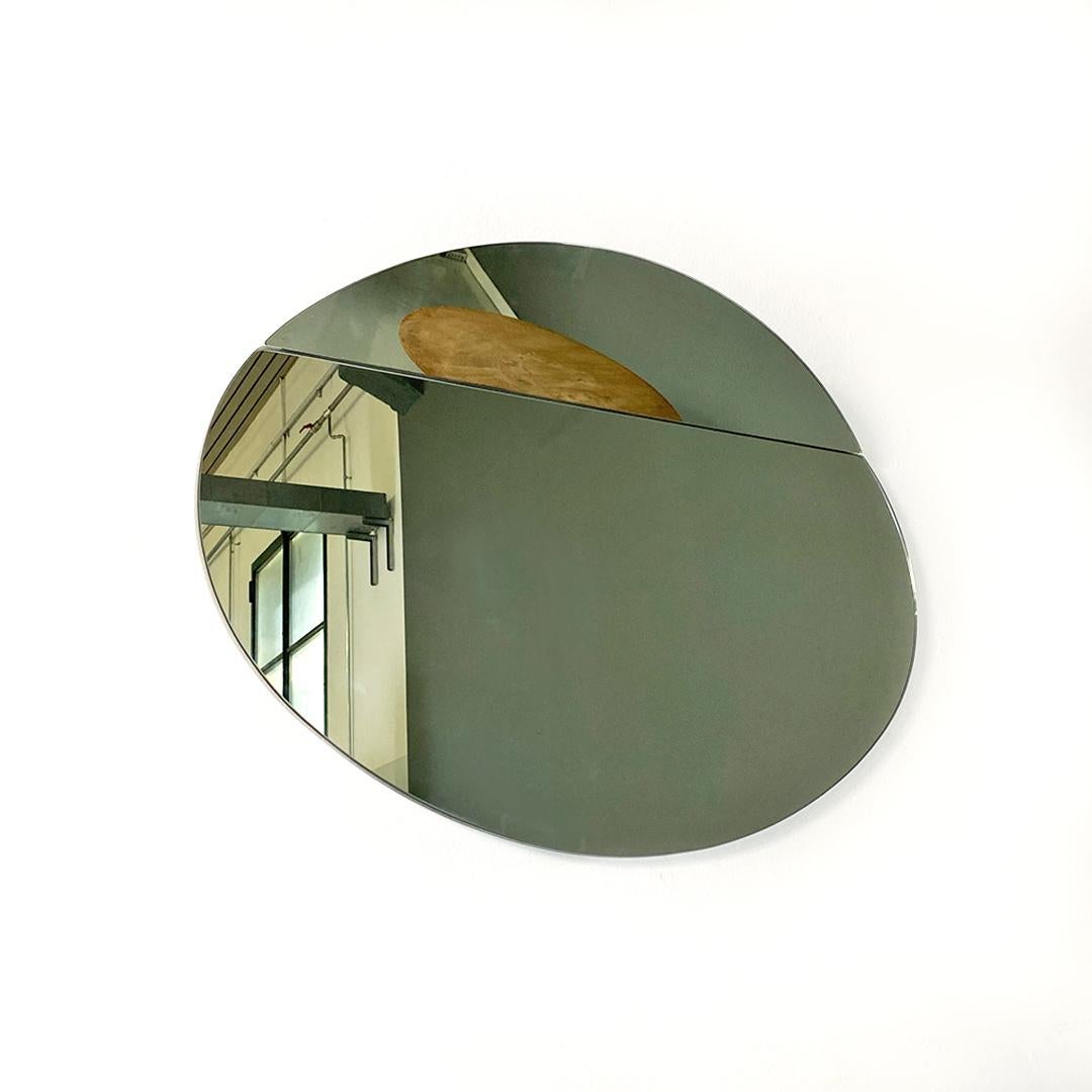 round mirror with creased metal