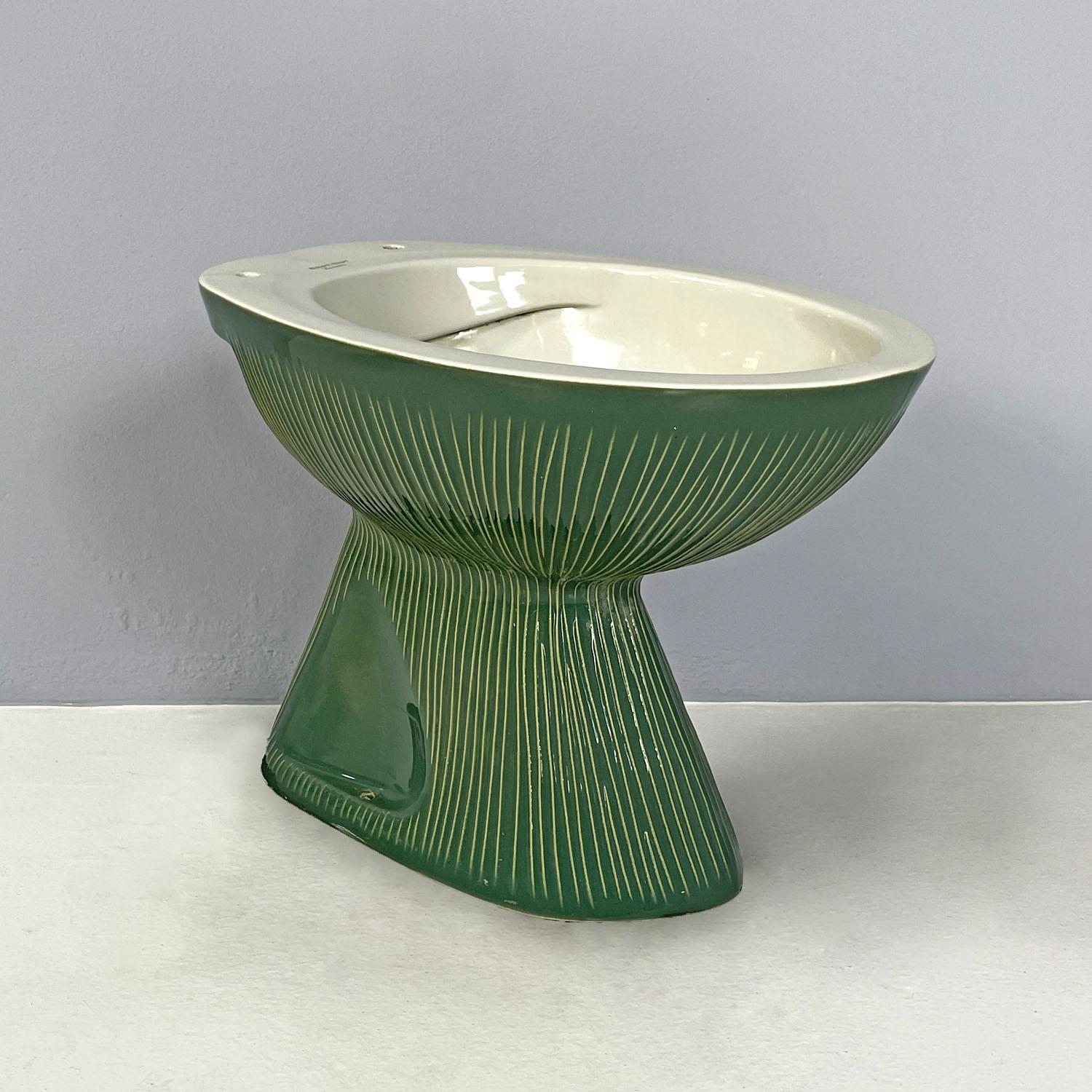 Italian modern water closet Gardena by Antonia Campi for Richard Ginori, 1970s
Water closet mod. Gardena in ceramic. The upper part is in white ceramic, while the rest is in green glazed ceramic with slightly raised yellow and light green vertical
