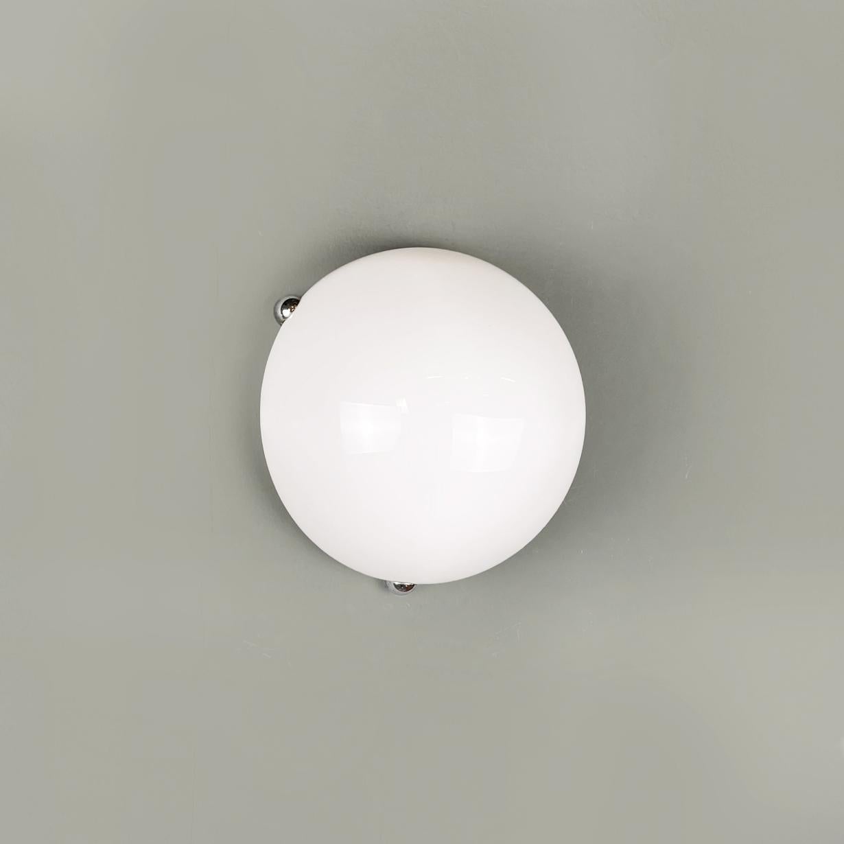 Italian modern White plexiglass wall light mod. Dalca by Gigi and Pepe Tanzi, 1970s
Small and pretty wall light mod. Dalca with hemispherical shape in white plexiglass. The lampshade is supported by a metal structure that ends with metal