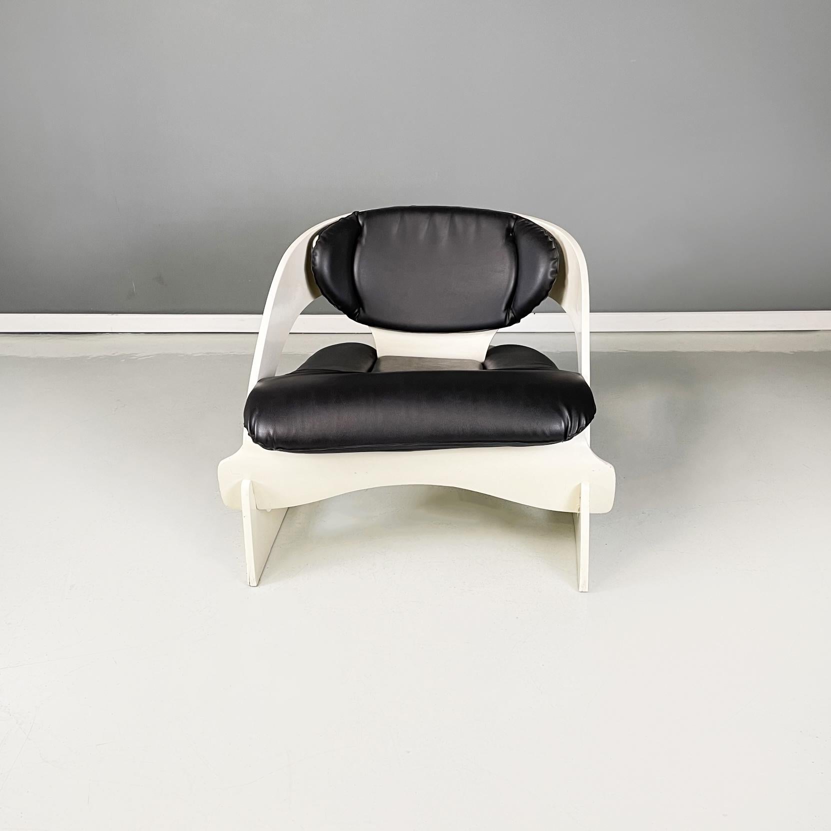 Italian modern white wood Armchair mod. 4801 by Joe Colombo for Kartell, 1970s
Armchair mod. 4801 with structure made up of different interlocking parts, in white painted wood. The semi-oval seat and the oval backrest are padded and covered in