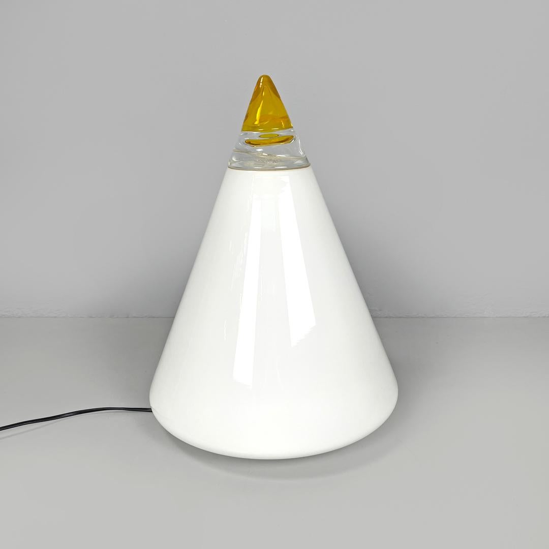 Italian modern white yellow Murano glass table lamp Grande Rio Giusto Toso 1970s
Table lamp mod. Grande Rio with round base in opaline white Murano glass. The structure is conical, the tip of the lamp is in transparent and yellow glass. The round