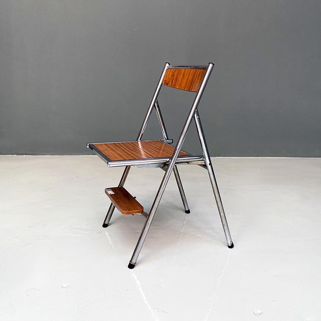 Italian modern wood effect laminate and chromed steel chair convertible into ladder, 1970s.
Chair convertible into ladder, with chromed steel rod frame and seat, backrest and steps covered in Formica with wood effect.
About Seventies
Very good