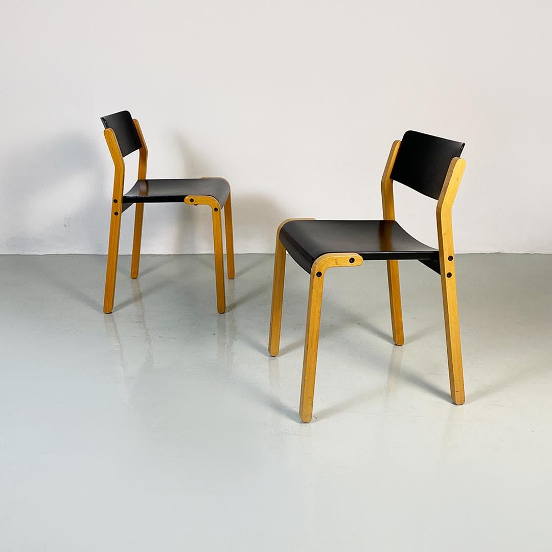 Italian modern light and black wood pair of Gruppo model chairs by De Pas, D'Urbino and Lomazzi for Bellato 1979.
Chairs mod. Group with light wood structure with square section legs and curved seat and back in black wood.
Designed by the DDL