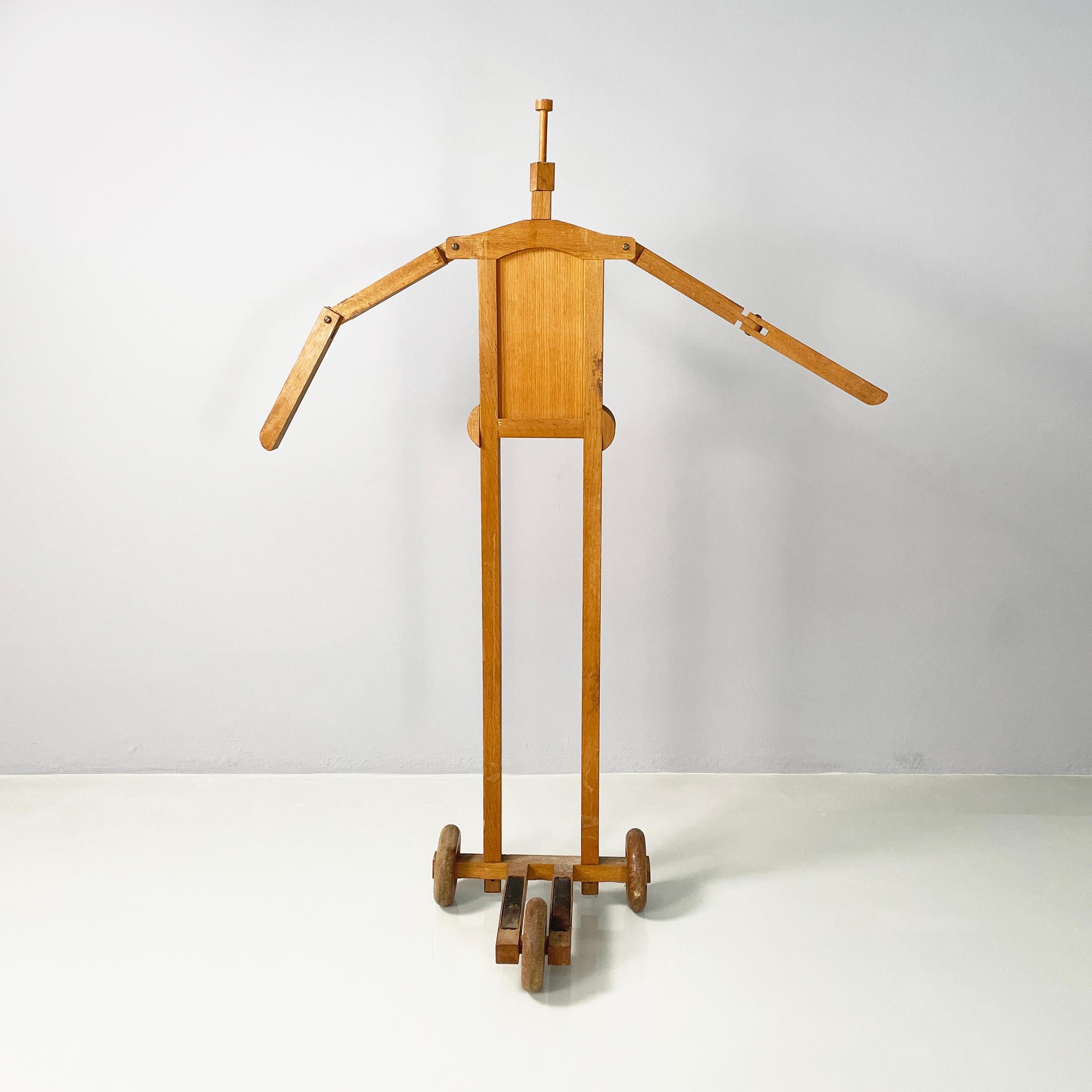 Italian modern Wooden valet stand with hat holder by BeroDesign and Cacharel, 1980s
Valet stand with hat holder made entirely of wood. This coat hanger has a human shape: in fact it has a square neck that can be used to place a hat, square-section